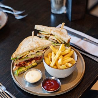 Pillars Bar & Kitchen Lunch menu with sandwich and fries
